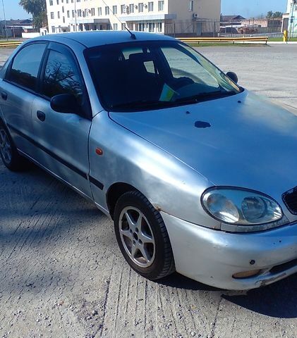 Серый Дэу Ланос, объемом двигателя 1.5 л и пробегом 315 тыс. км за 1400 $, фото 3 на Automoto.ua