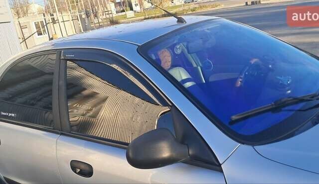 Сірий Деу Ланос, об'ємом двигуна 1.39 л та пробігом 220 тис. км за 3000 $, фото 11 на Automoto.ua