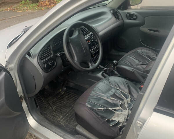 Сірий Деу Ланос, об'ємом двигуна 1.6 л та пробігом 170 тис. км за 1600 $, фото 4 на Automoto.ua