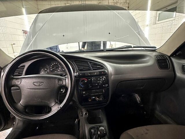 Сірий Деу Ланос, об'ємом двигуна 1.5 л та пробігом 150 тис. км за 1550 $, фото 6 на Automoto.ua