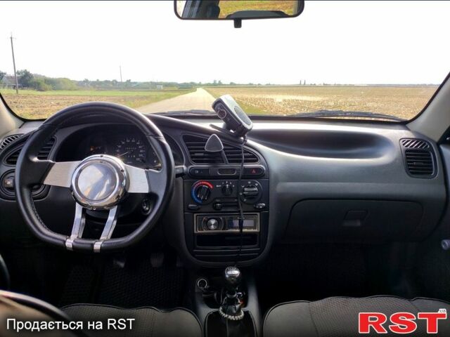 Серый Дэу Ланос, объемом двигателя 15 л и пробегом 294 тыс. км за 2500 $, фото 4 на Automoto.ua