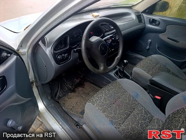 Серый Дэу Ланос, объемом двигателя 1.4 л и пробегом 240 тыс. км за 1700 $, фото 7 на Automoto.ua