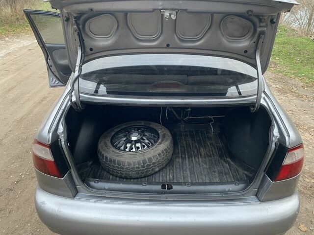 Сірий Деу Ланос, об'ємом двигуна 1.5 л та пробігом 206 тис. км за 1381 $, фото 8 на Automoto.ua