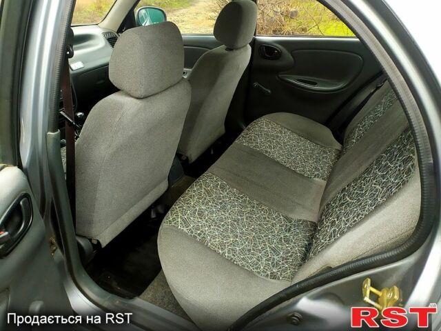 Серый Дэу Ланос, объемом двигателя 1.6 л и пробегом 200 тыс. км за 2599 $, фото 11 на Automoto.ua