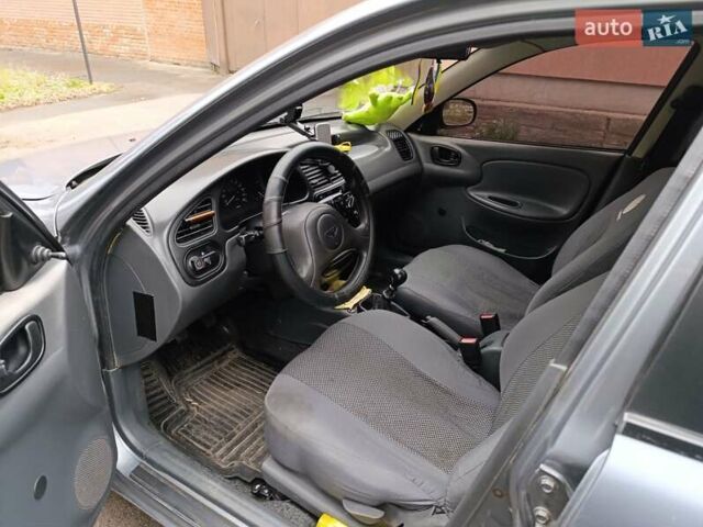 Серый Дэу Ланос, объемом двигателя 1.5 л и пробегом 243 тыс. км за 2850 $, фото 3 на Automoto.ua