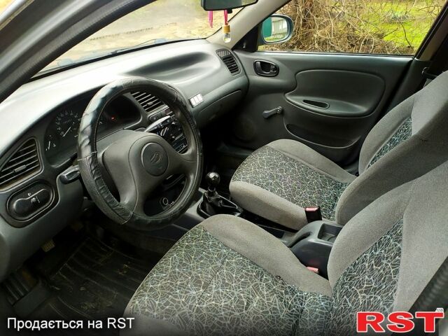 Серый Дэу Ланос, объемом двигателя 1.6 л и пробегом 200 тыс. км за 2599 $, фото 10 на Automoto.ua