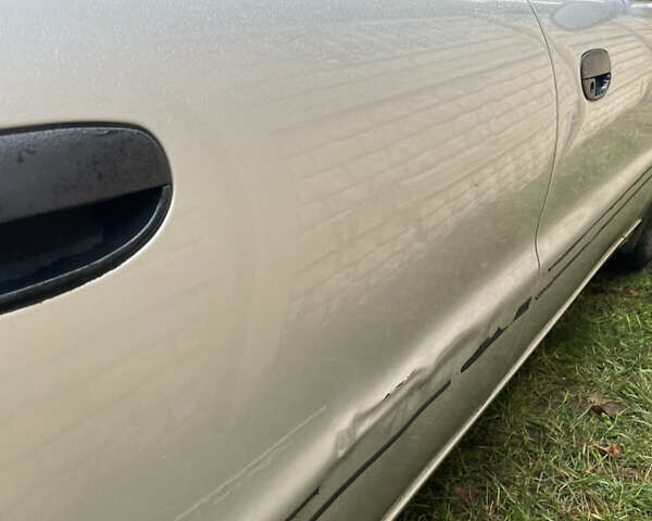 Сірий Деу Ланос, об'ємом двигуна 1.6 л та пробігом 139 тис. км за 3100 $, фото 12 на Automoto.ua