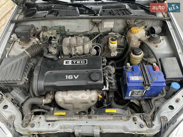 Сірий Деу Ланос, об'ємом двигуна 1.6 л та пробігом 139 тис. км за 3100 $, фото 9 на Automoto.ua