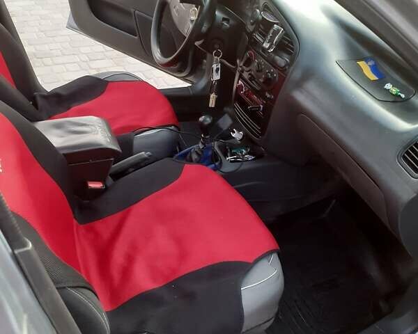 Серый Дэу Ланос, объемом двигателя 1.5 л и пробегом 241 тыс. км за 3000 $, фото 7 на Automoto.ua