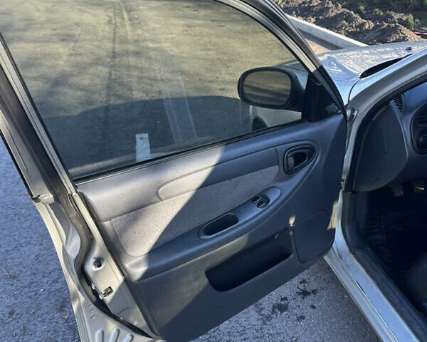 Сірий Деу Ланос, об'ємом двигуна 1.5 л та пробігом 439 тис. км за 2600 $, фото 5 на Automoto.ua