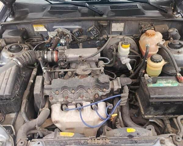 Серый Дэу Ланос, объемом двигателя 1.5 л и пробегом 224 тыс. км за 2400 $, фото 5 на Automoto.ua