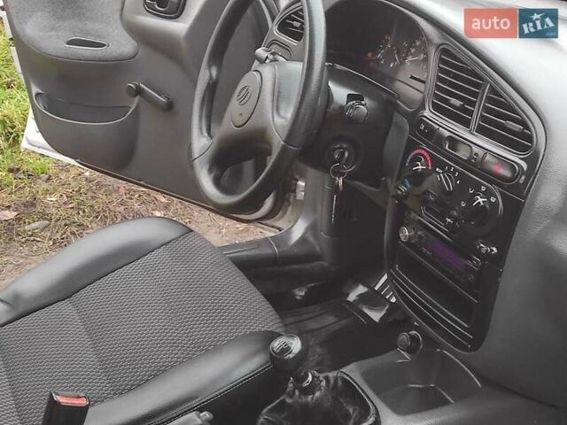 Серый Дэу Ланос, объемом двигателя 1.5 л и пробегом 156 тыс. км за 1950 $, фото 9 на Automoto.ua