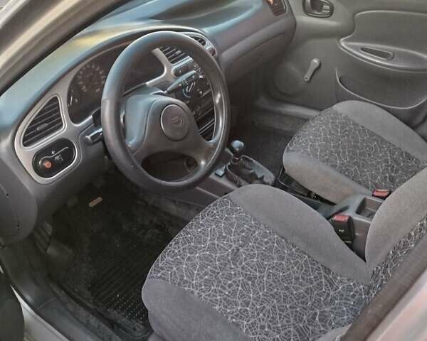 Сірий Деу Ланос, об'ємом двигуна 1.5 л та пробігом 159 тис. км за 2500 $, фото 3 на Automoto.ua