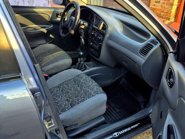 Сірий Деу Ланос, об'ємом двигуна 1.5 л та пробігом 174 тис. км за 2700 $, фото 7 на Automoto.ua