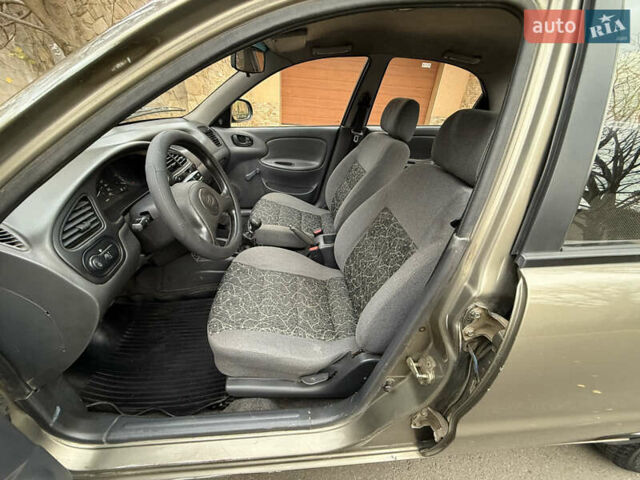 Серый Дэу Ланос, объемом двигателя 1.5 л и пробегом 201 тыс. км за 2650 $, фото 13 на Automoto.ua