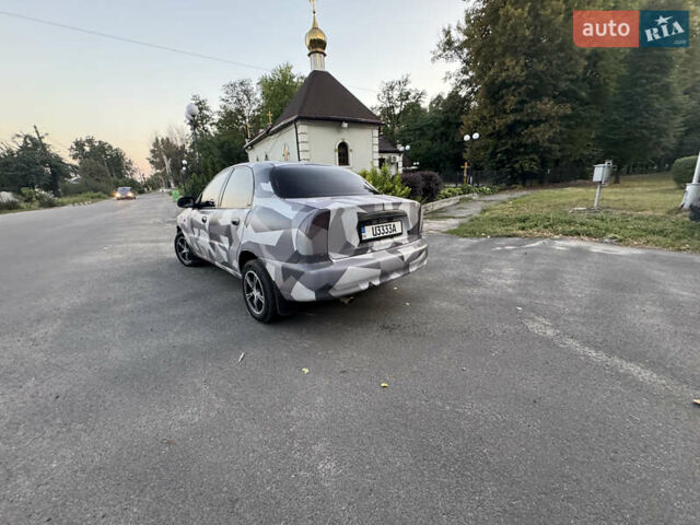 Сірий Деу Ланос, об'ємом двигуна 0 л та пробігом 160 тис. км за 3750 $, фото 3 на Automoto.ua