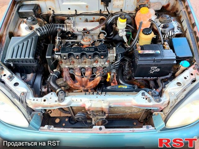 Серый Дэу Ланос, объемом двигателя 1.5 л и пробегом 187 тыс. км за 2700 $, фото 13 на Automoto.ua