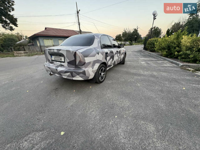 Сірий Деу Ланос, об'ємом двигуна 0 л та пробігом 160 тис. км за 3750 $, фото 4 на Automoto.ua