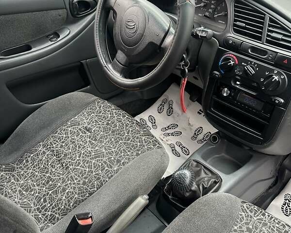 Сірий Деу Ланос, об'ємом двигуна 1.5 л та пробігом 203 тис. км за 3700 $, фото 20 на Automoto.ua