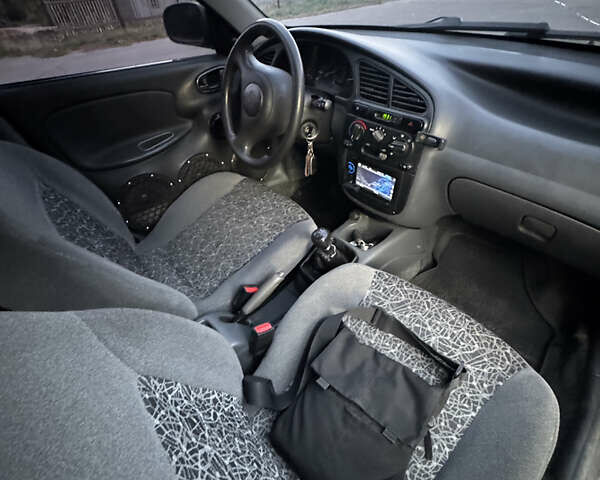 Сірий Деу Ланос, об'ємом двигуна 0 л та пробігом 160 тис. км за 3750 $, фото 7 на Automoto.ua