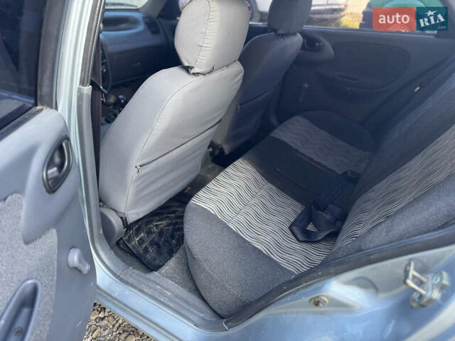 Сірий Деу Ланос, об'ємом двигуна 1.35 л та пробігом 200 тис. км за 1399 $, фото 5 на Automoto.ua