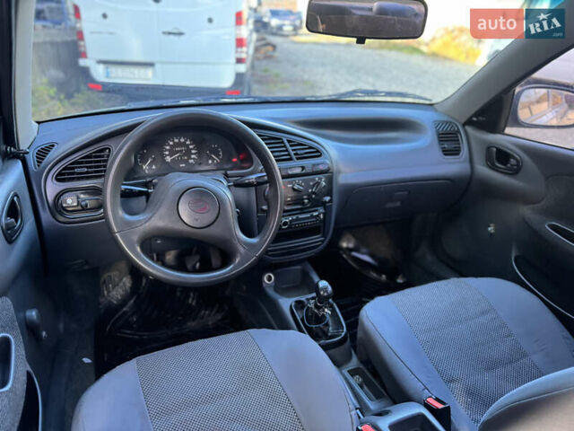 Сірий Деу Ланос, об'ємом двигуна 1.35 л та пробігом 200 тис. км за 1399 $, фото 4 на Automoto.ua