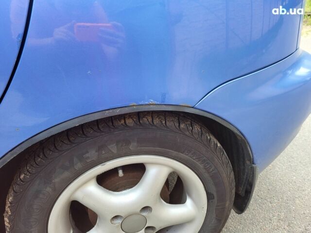Синий Дэу Ланос, объемом двигателя 0 л и пробегом 190 тыс. км за 3300 $, фото 7 на Automoto.ua