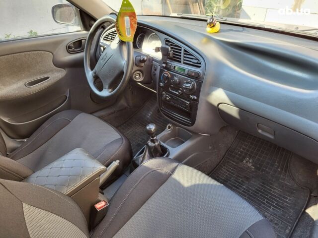 Синий Дэу Ланос, объемом двигателя 0 л и пробегом 190 тыс. км за 3300 $, фото 8 на Automoto.ua