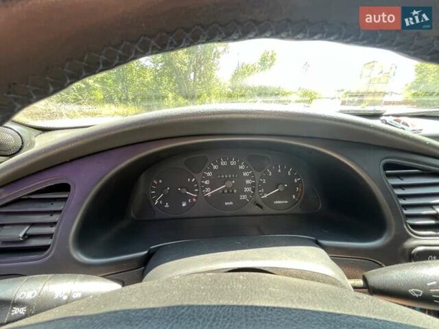 Синий Дэу Ланос, объемом двигателя 1.6 л и пробегом 200 тыс. км за 2600 $, фото 5 на Automoto.ua