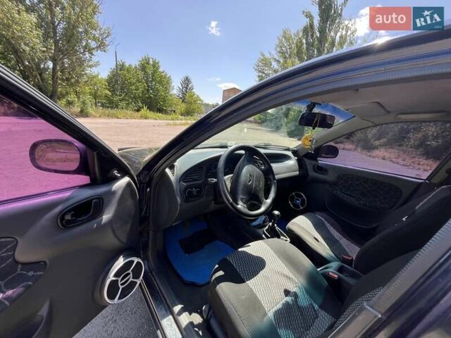 Синий Дэу Ланос, объемом двигателя 1.6 л и пробегом 200 тыс. км за 2600 $, фото 4 на Automoto.ua