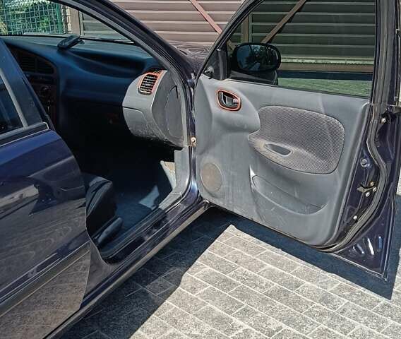 Синій Деу Ланос, об'ємом двигуна 1.6 л та пробігом 276 тис. км за 1100 $, фото 4 на Automoto.ua