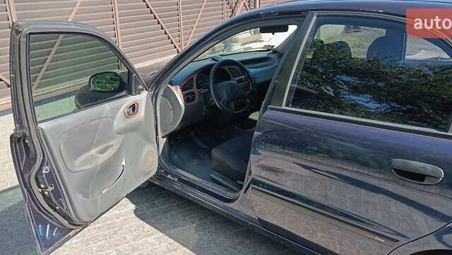 Синій Деу Ланос, об'ємом двигуна 1.6 л та пробігом 276 тис. км за 1100 $, фото 15 на Automoto.ua