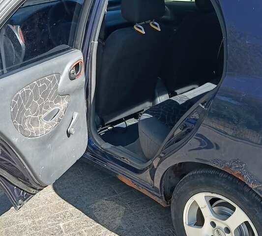 Синій Деу Ланос, об'ємом двигуна 1.6 л та пробігом 276 тис. км за 1100 $, фото 7 на Automoto.ua