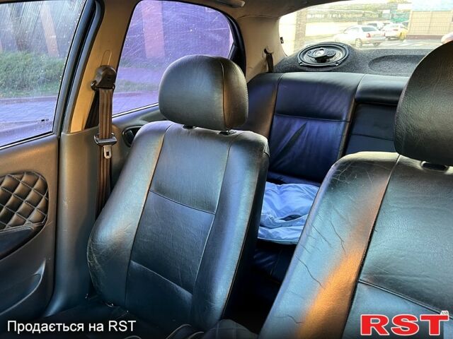 Синий Дэу Ланос, объемом двигателя 1.5 л и пробегом 328 тыс. км за 1600 $, фото 9 на Automoto.ua