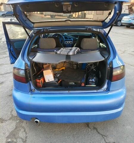 Синий Дэу Ланос, объемом двигателя 1.5 л и пробегом 292 тыс. км за 2300 $, фото 8 на Automoto.ua