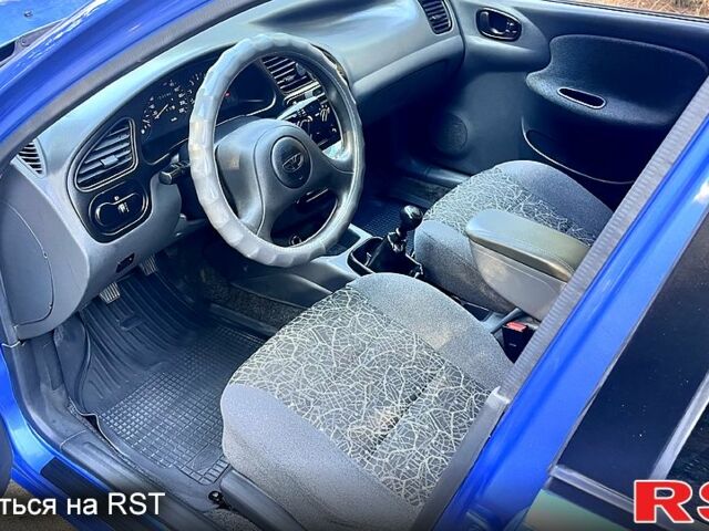 Синій Деу Ланос, об'ємом двигуна 1.5 л та пробігом 223 тис. км за 3500 $, фото 3 на Automoto.ua
