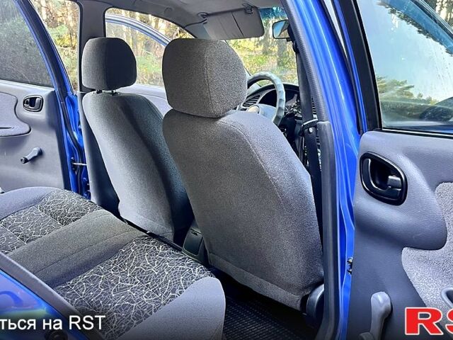 Синій Деу Ланос, об'ємом двигуна 1.5 л та пробігом 223 тис. км за 3500 $, фото 4 на Automoto.ua