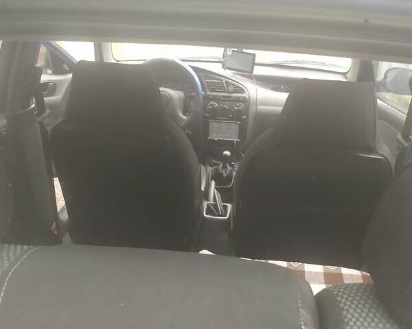 Синий Дэу Ланос, объемом двигателя 1.5 л и пробегом 144 тыс. км за 3100 $, фото 16 на Automoto.ua