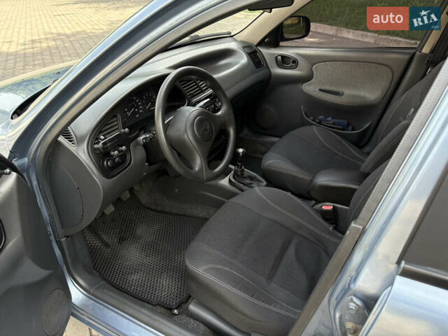 Синий Дэу Ланос, объемом двигателя 1.5 л и пробегом 203 тыс. км за 3000 $, фото 3 на Automoto.ua