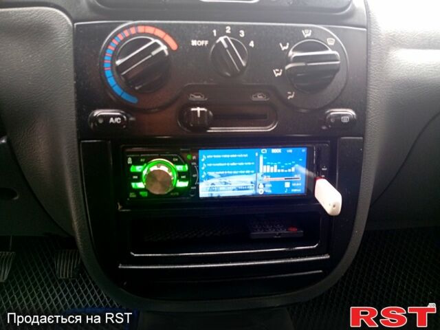 Синий Дэу Ланос, объемом двигателя 1.5 л и пробегом 220 тыс. км за 2000 $, фото 5 на Automoto.ua