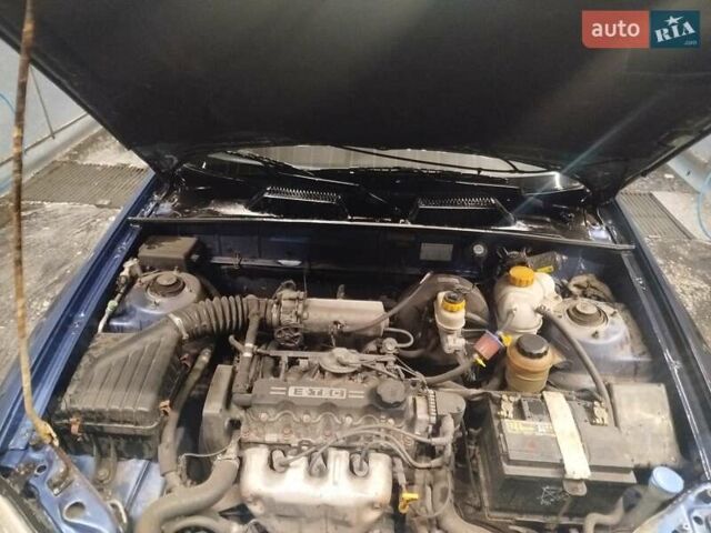 Синій Деу Ланос, об'ємом двигуна 1.5 л та пробігом 230 тис. км за 2150 $, фото 11 на Automoto.ua