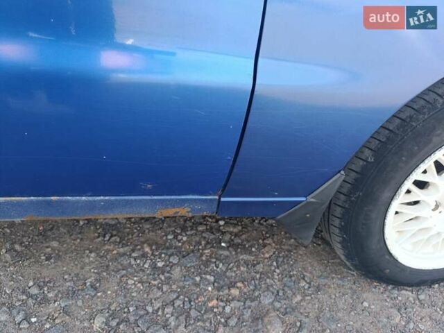 Синій Деу Ланос, об'ємом двигуна 1.5 л та пробігом 420 тис. км за 1800 $, фото 2 на Automoto.ua