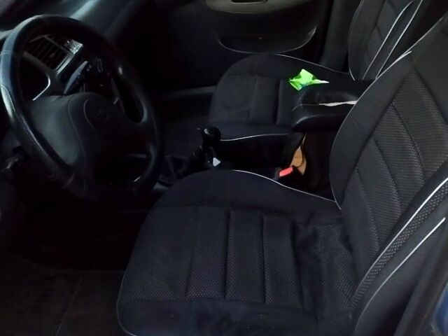 Синий Дэу Ланос, объемом двигателя 1.5 л и пробегом 300 тыс. км за 1350 $, фото 5 на Automoto.ua