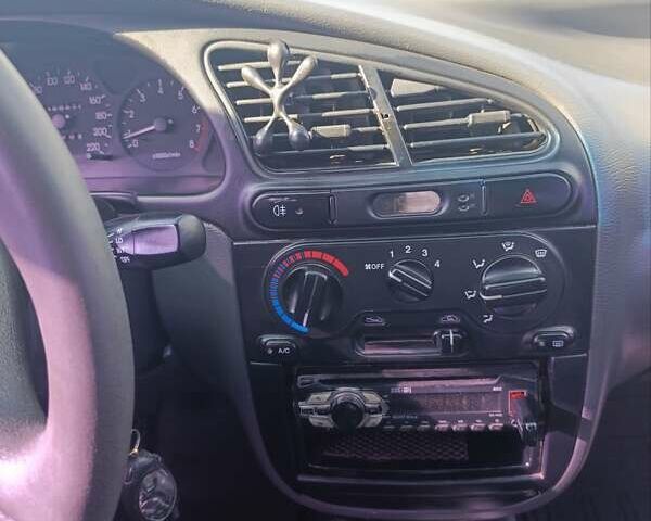 Синій Деу Ланос, об'ємом двигуна 1.5 л та пробігом 420 тис. км за 1800 $, фото 16 на Automoto.ua