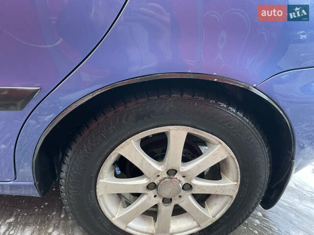 Синий Дэу Ланос, объемом двигателя 1.5 л и пробегом 85 тыс. км за 3700 $, фото 7 на Automoto.ua