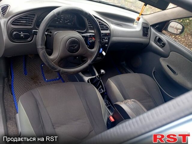 Синий Дэу Ланос, объемом двигателя 1.5 л и пробегом 220 тыс. км за 2000 $, фото 4 на Automoto.ua