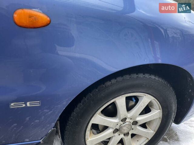 Синий Дэу Ланос, объемом двигателя 1.5 л и пробегом 85 тыс. км за 3700 $, фото 9 на Automoto.ua