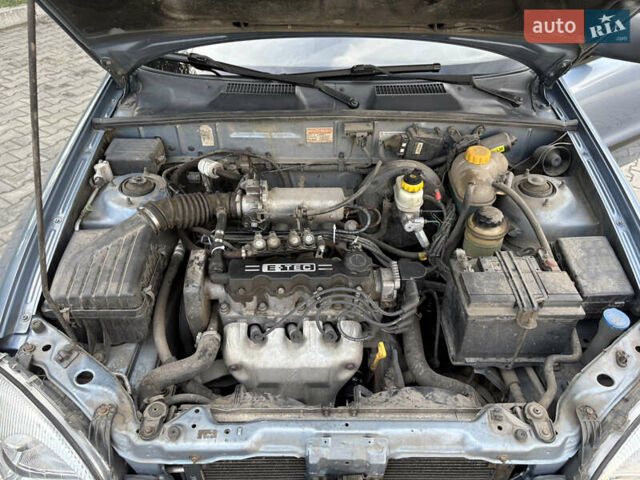 Синий Дэу Ланос, объемом двигателя 1.5 л и пробегом 203 тыс. км за 3000 $, фото 5 на Automoto.ua