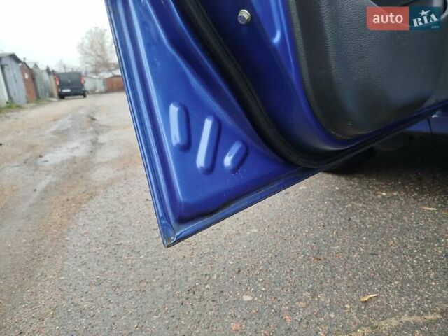 Синій Деу Ланос, об'ємом двигуна 1.5 л та пробігом 232 тис. км за 2650 $, фото 27 на Automoto.ua