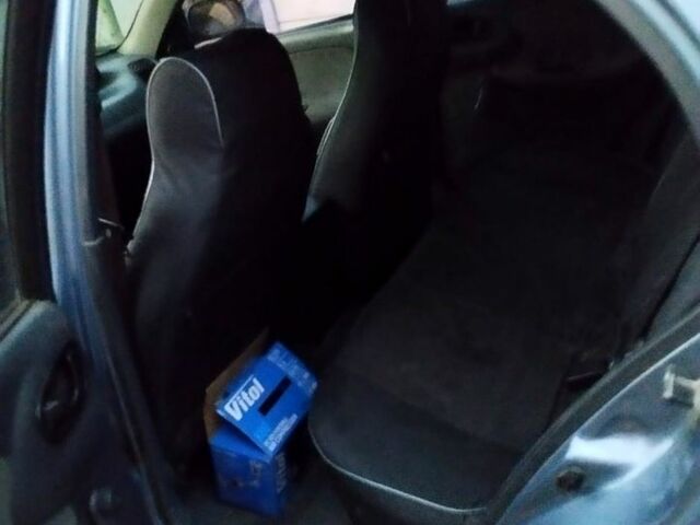 Синий Дэу Ланос, объемом двигателя 1.5 л и пробегом 300 тыс. км за 1350 $, фото 3 на Automoto.ua